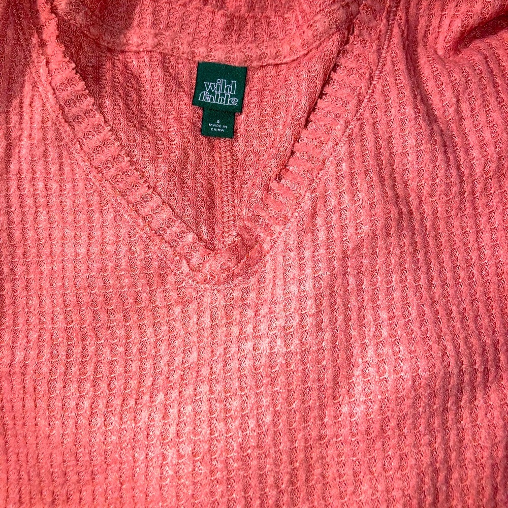 Worn twice very soft material knit blouse. Runs flowy .